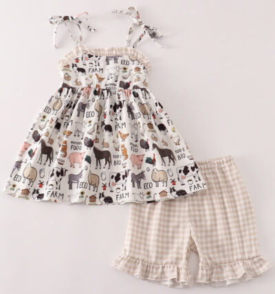 Girls 18 months to 6t Girl 18m-6T Features sleeveless dress, animal print, ruffles shorts n this 2 piece set! Bring the charm of the countryside to your little one’s wardrobe with our farm animal outfit collection! Featuring playful prints like cows, pigs, and chickens, these soft and stylish sets are designed for twins and siblings ages 0–5T. Perfectly coordinated, comfy, and made for everyday adventures — only at Sync Style Twins.twin outfits, farm animal clothes for kids, organic toddler clothing, matching twin sets, gender-neutral baby clothes, toddler romper set, bio cotton kidswear