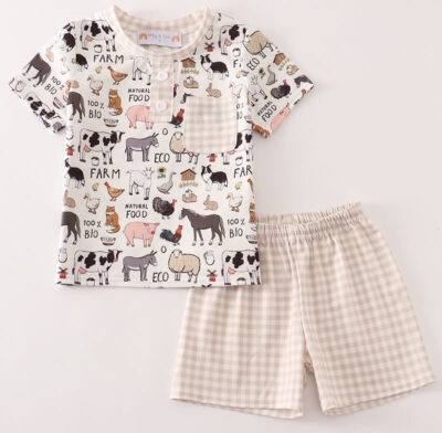Boys 18 months to 6t Boys 18m-6T Features short sleeve top, animal print, and shorts in this 2 piece set! Bring the charm of the countryside to your little one’s wardrobe with our farm animal outfit collection! Featuring playful prints like cows, pigs, and chickens, these soft and stylish sets are designed for twins and siblings ages 0–5T. Perfectly coordinated, comfy, and made for everyday adventures — only at Sync Style Twins.twin outfits, farm animal clothes for kids, organic toddler clothing, matching twin sets, gender-neutral baby clothes, toddler romper set, bio cotton kidswear