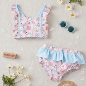 Two-piece pink chicken floral swimsuit for toddlers with floral accents and blue bow